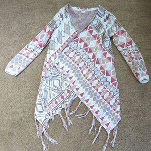 Sun & Shadow V-Neck Sweater with Geometric Design